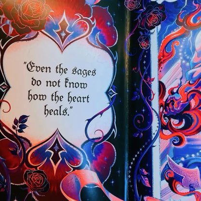 Never The Roses Hard Cover Signed Special Edition with Reversible Dust Jacket